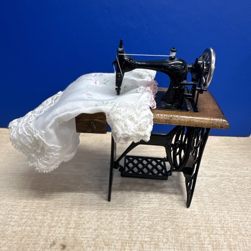 Dolls house scale - dolls, treadle
